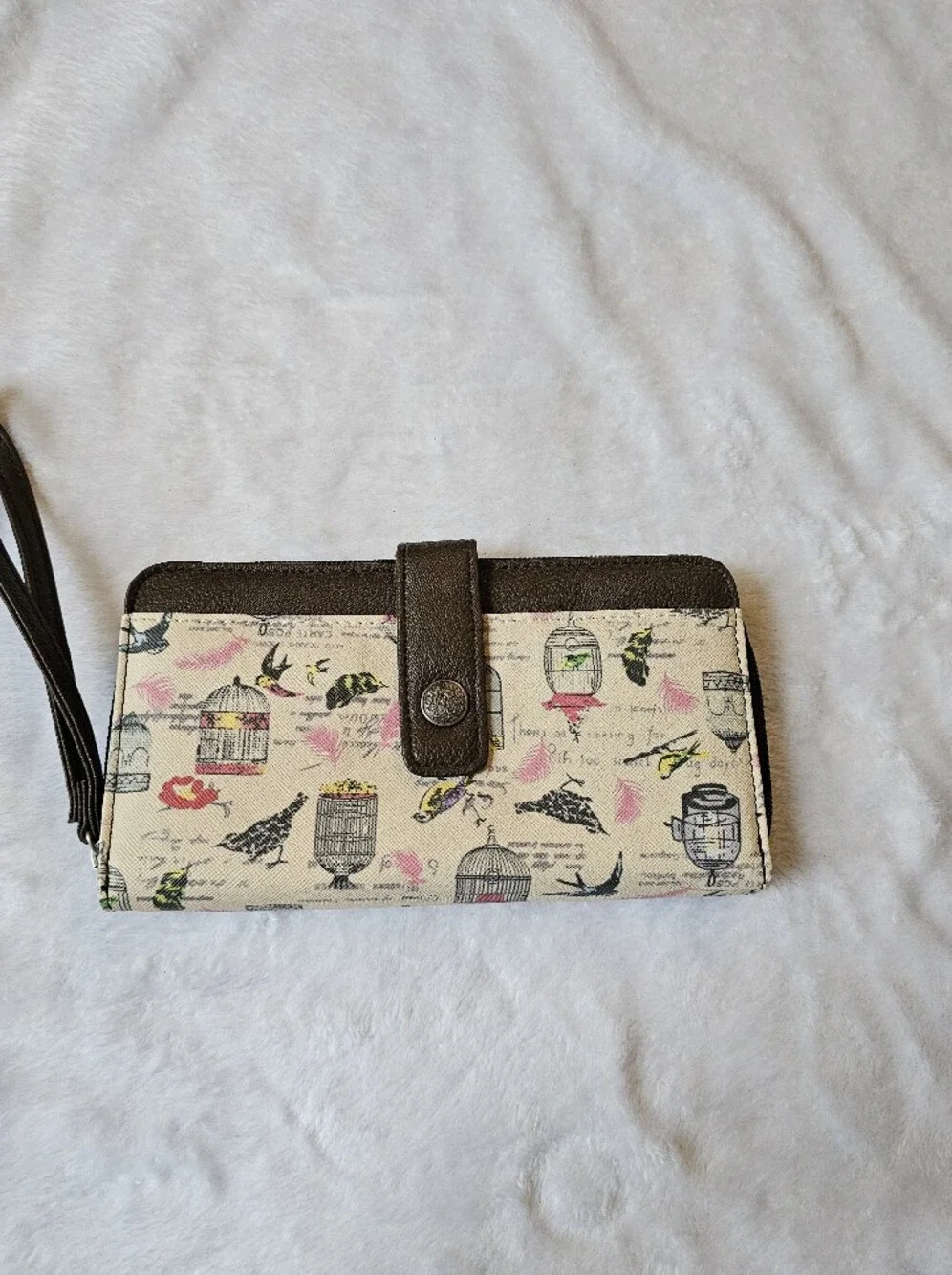 Relic Beige Canvas Wristlet Clutch with Brown Trim and Birdcage Print